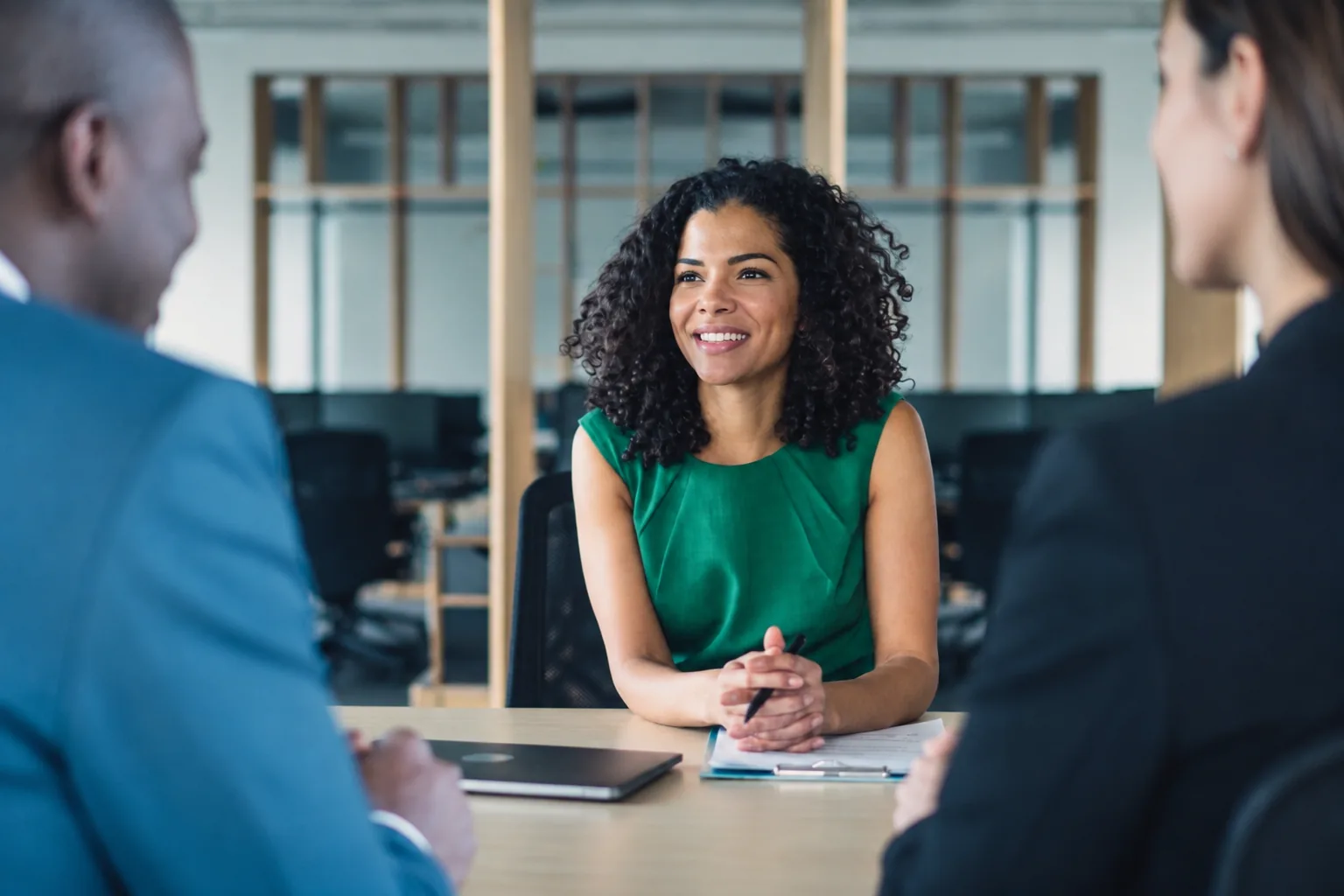 A practitioner in an interview-style conversation as part of the network application process.